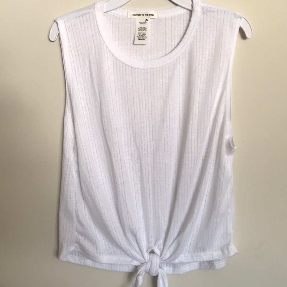 Caution to the Wind women Front tie breathable top.